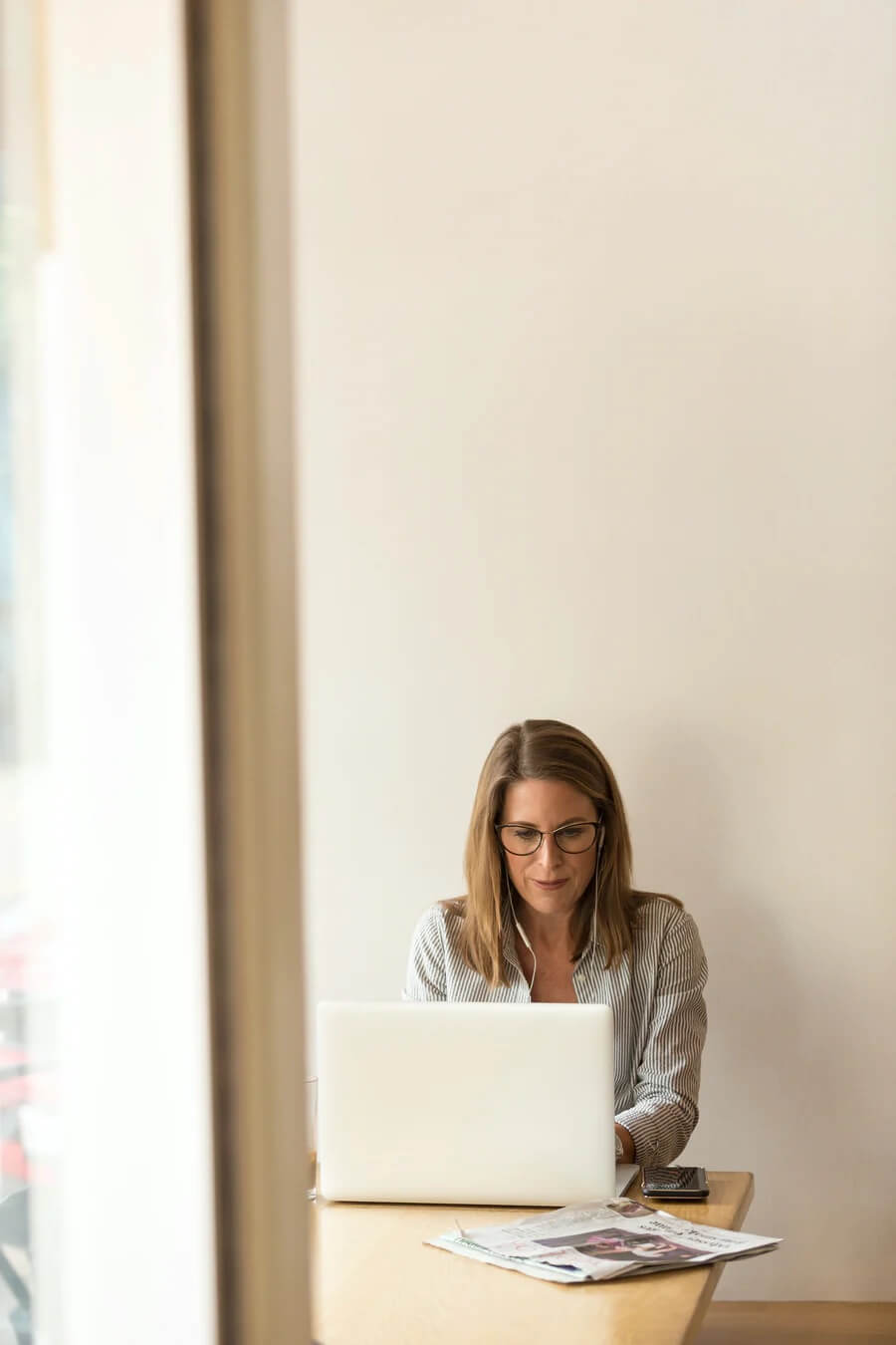 woman in office on laptop